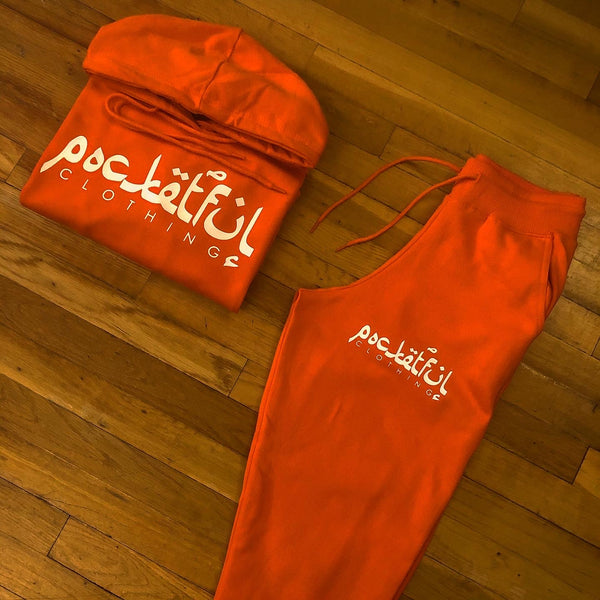 Arabic - Orange Sweatsuit - White Design